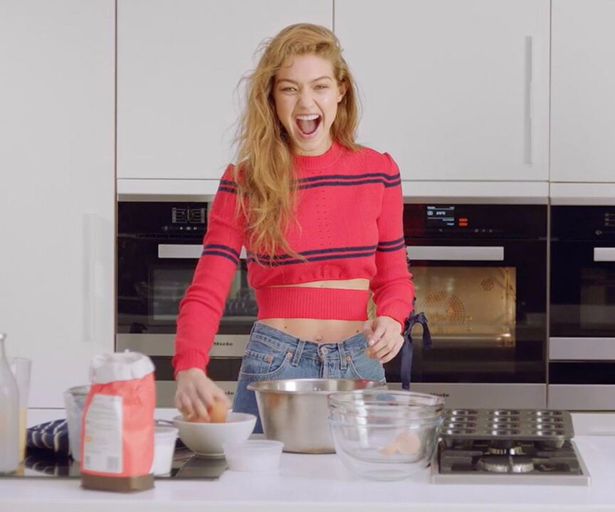 A slim girl prepares a healthy breakfast